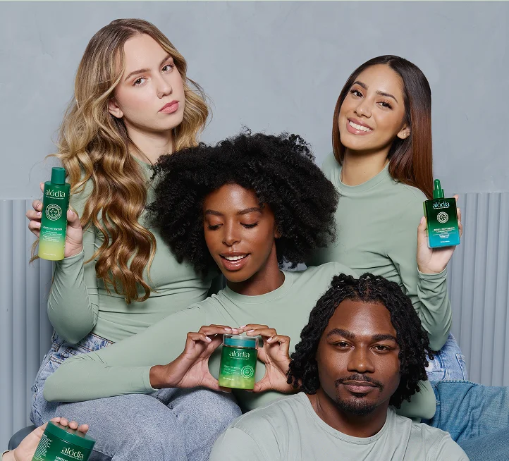 Diverse group of people with different hair types using Alodia products