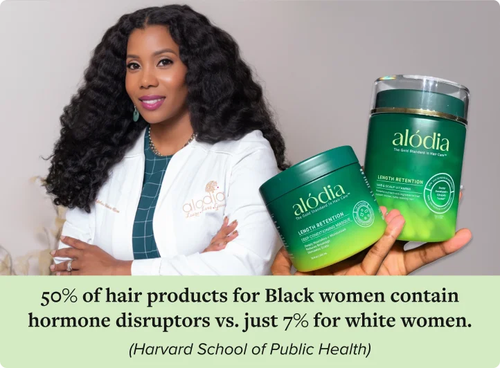 Dr. Isfahan holding Alodia products